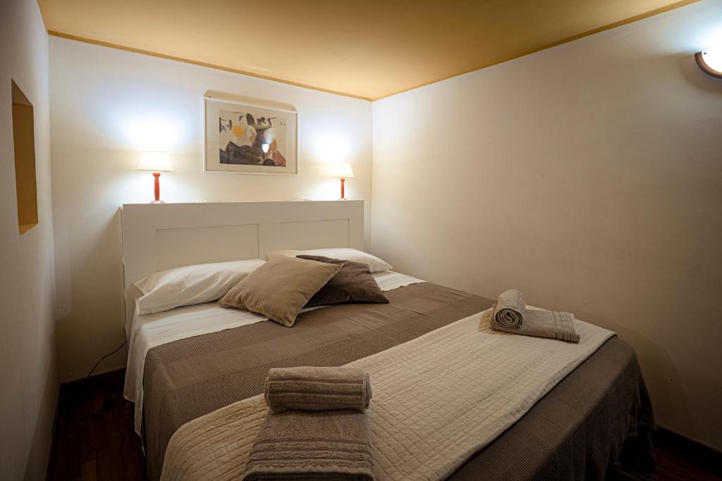 A bed or beds in a room at Catania Amuri Home