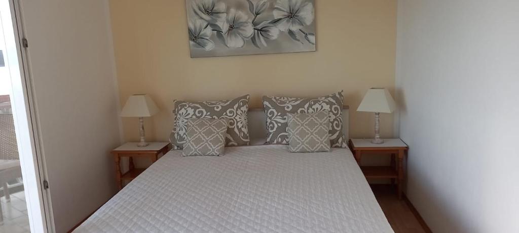 Postel nebo postele na pokoji v ubytování Apartments Fina