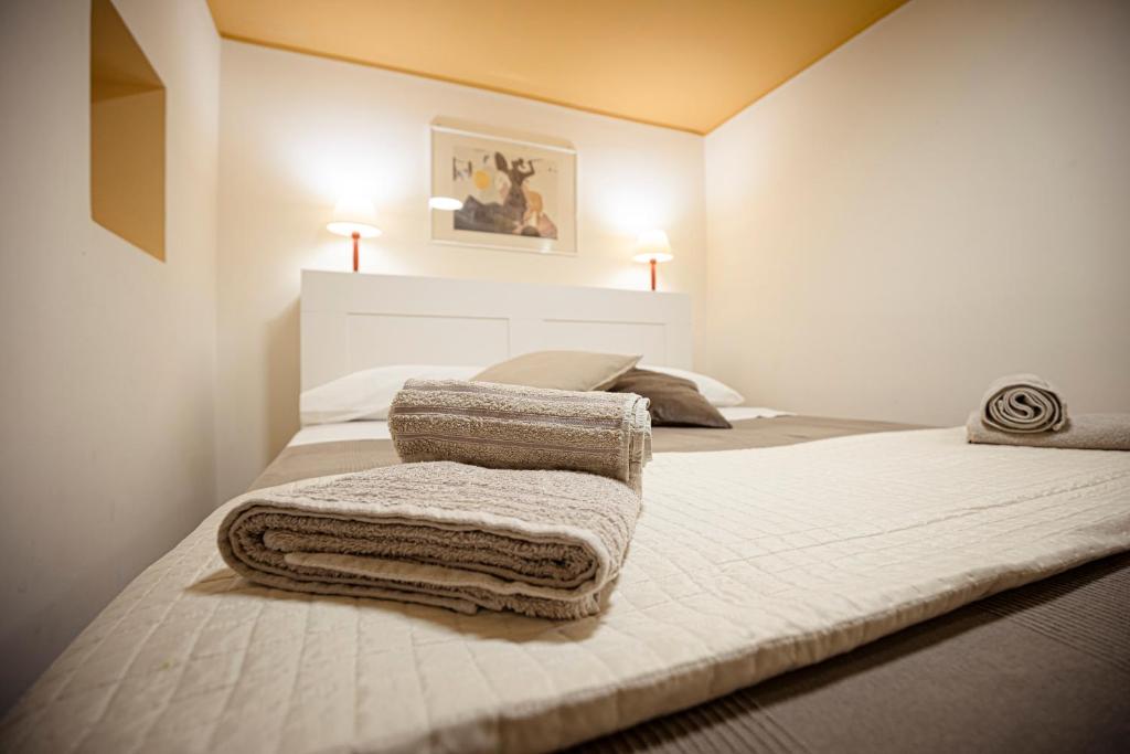 A bed or beds in a room at Catania Amuri Home