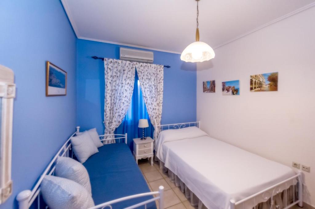 Posteľ alebo postele v izbe v ubytovaní Wave and Sea Holiday Home