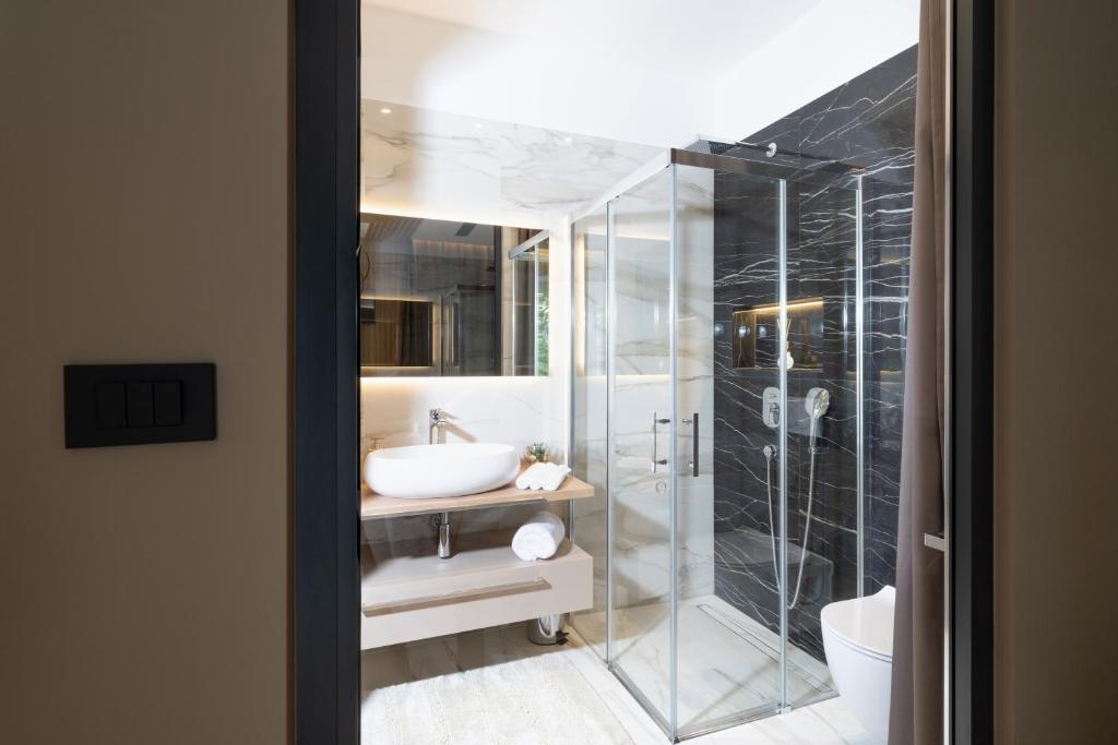 Koupelna v ubytování Premium Apartments