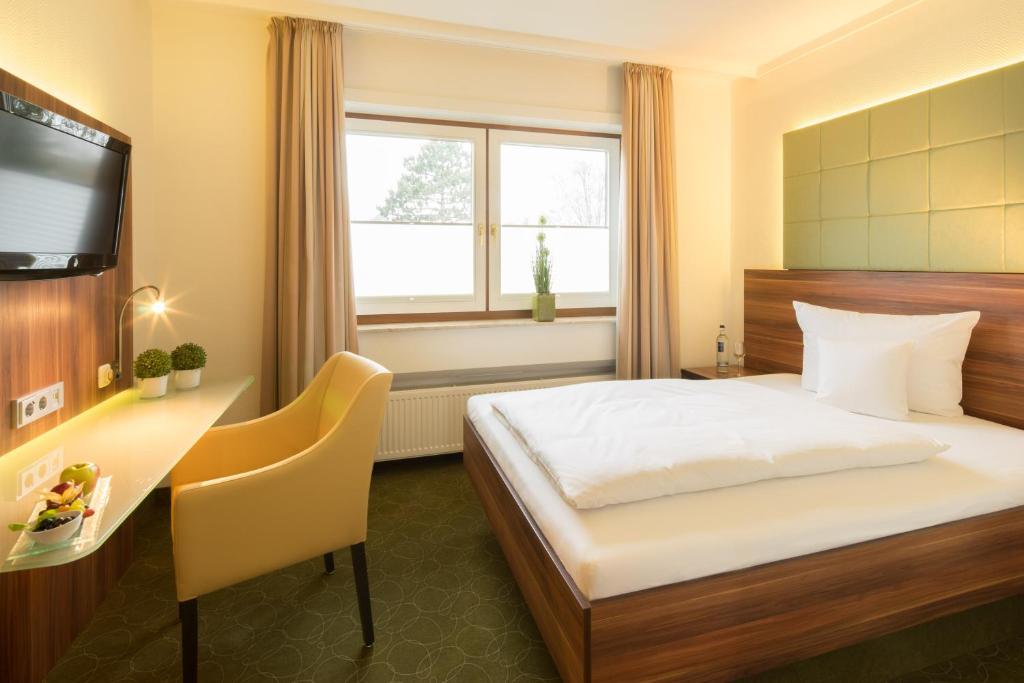 Postel nebo postele na pokoji v ubytování Hotel Celler Tor