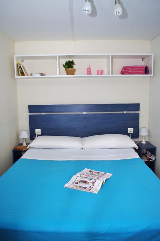 Postel nebo postele na pokoji v ubytování Happy Camp Mobile Homes in Camping Terme Čatež