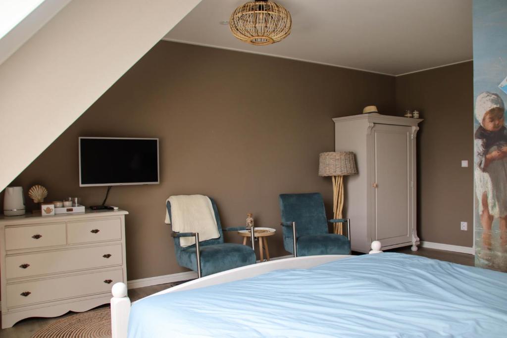 Postel nebo postele na pokoji v ubytování B&B Schotererf
