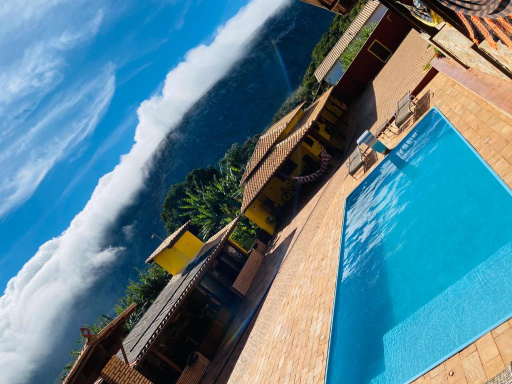 Výhled na bazén z ubytování Vila Dos Sonhos Lapinha nebo okolí
