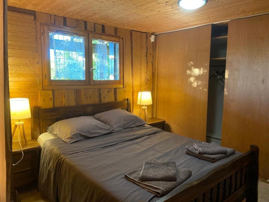 Postel nebo postele na pokoji v ubytování Le petit chalet des Greys