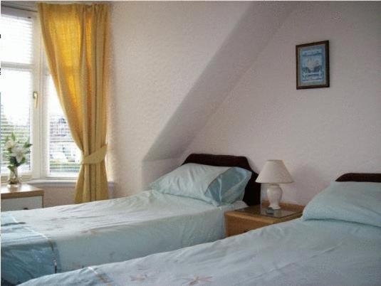 Katil atau katil-katil dalam bilik di Kilkerran Guest House