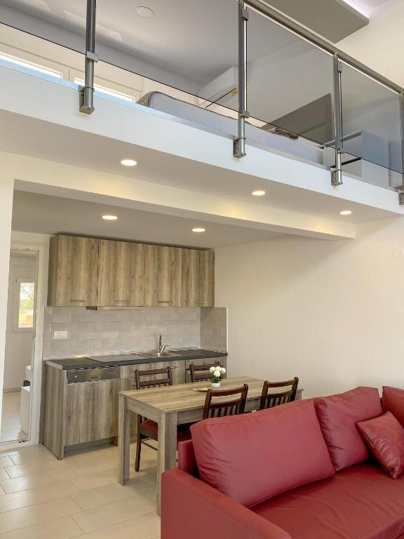 A kitchen or kitchenette at IL-Holidays Paralia
