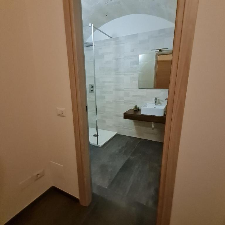 Koupelna v ubytování LITHOS ROOMs