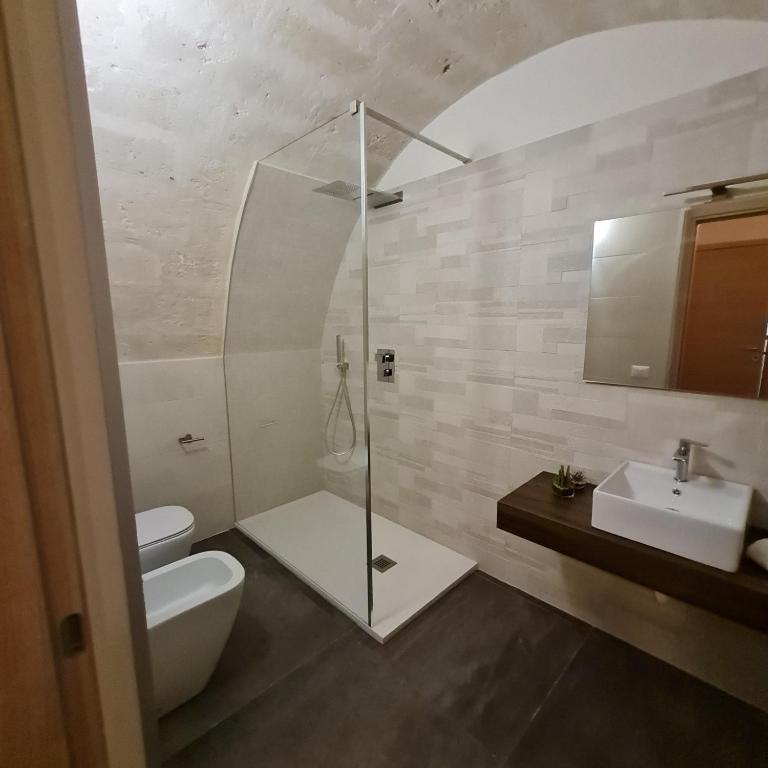 Koupelna v ubytování LITHOS ROOMs