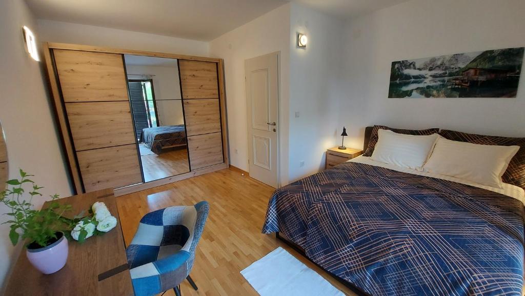 Postel nebo postele na pokoji v ubytování Apartments Nina, Pinta & Santa Maria