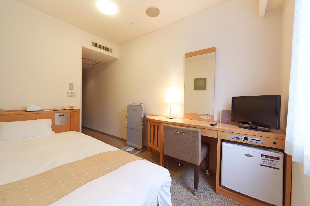 TV a/nebo společenská místnost v ubytování Nest Hotel Kumamoto