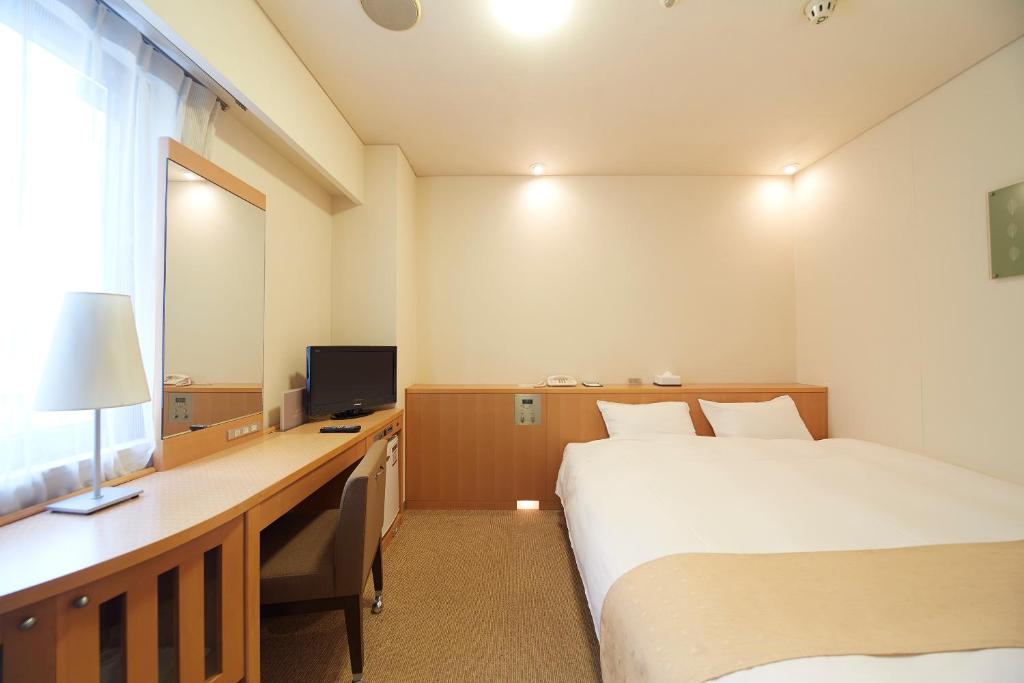 TV a/nebo společenská místnost v ubytování Nest Hotel Kumamoto