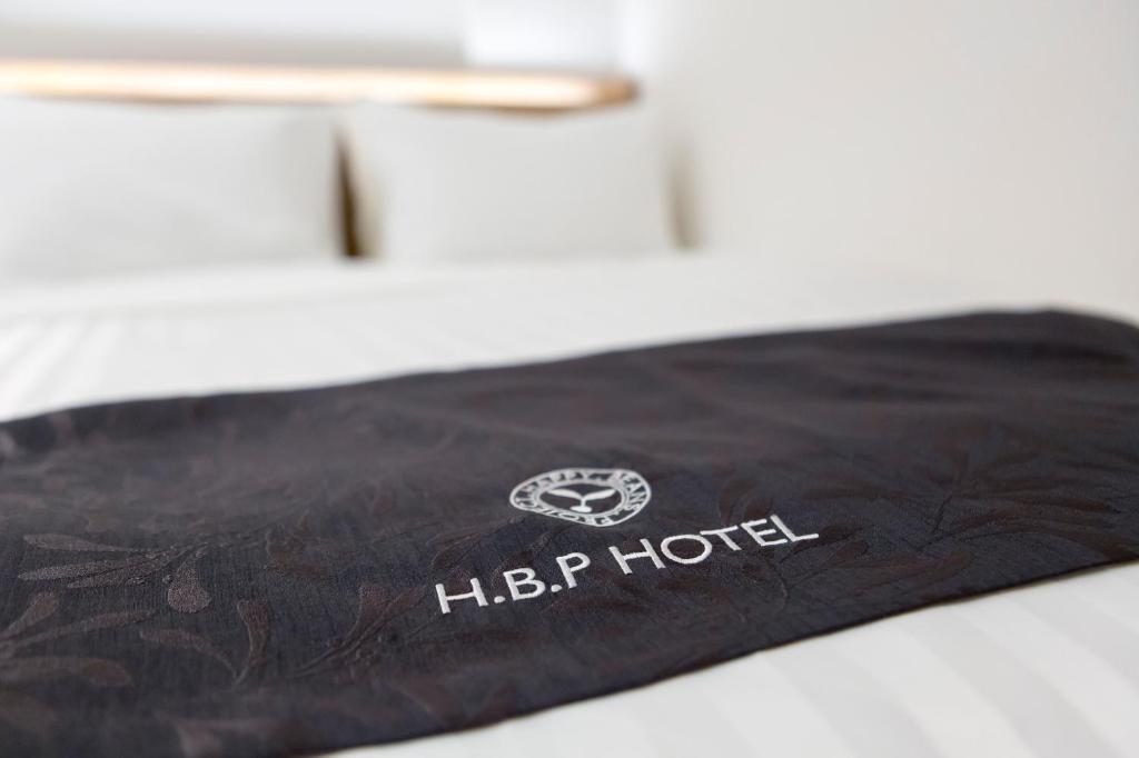 Postel nebo postele na pokoji v ubytování H.B.P HOTEL