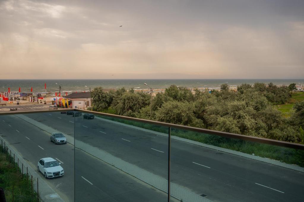 a view of a highway with cars on the road at HOME for FOUR in Mamaia Sat/Năvodari