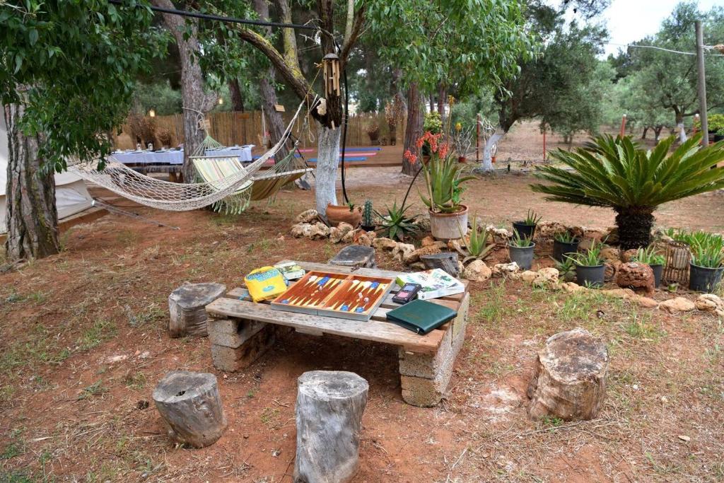 A garden outside Glamping at a Lovely Tent in Skiaxtro- Marathopoli