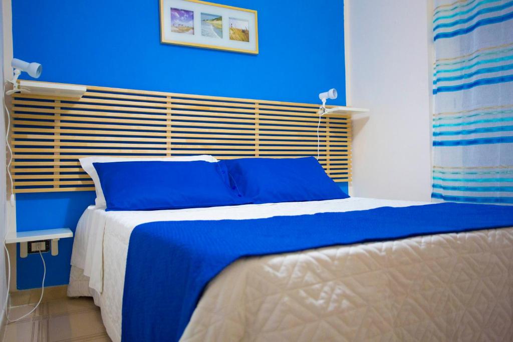 Postel nebo postele na pokoji v ubytování B&B Terra Nobile - Portopalo