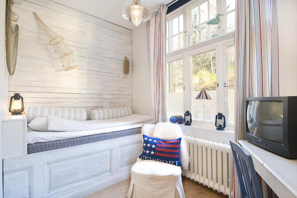 Postel nebo postele na pokoji v ubytování Hotell Aina
