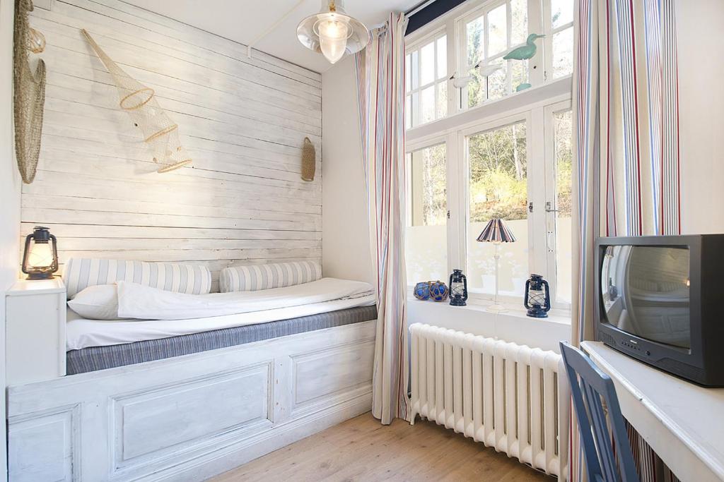 Postel nebo postele na pokoji v ubytování Hotell Aina