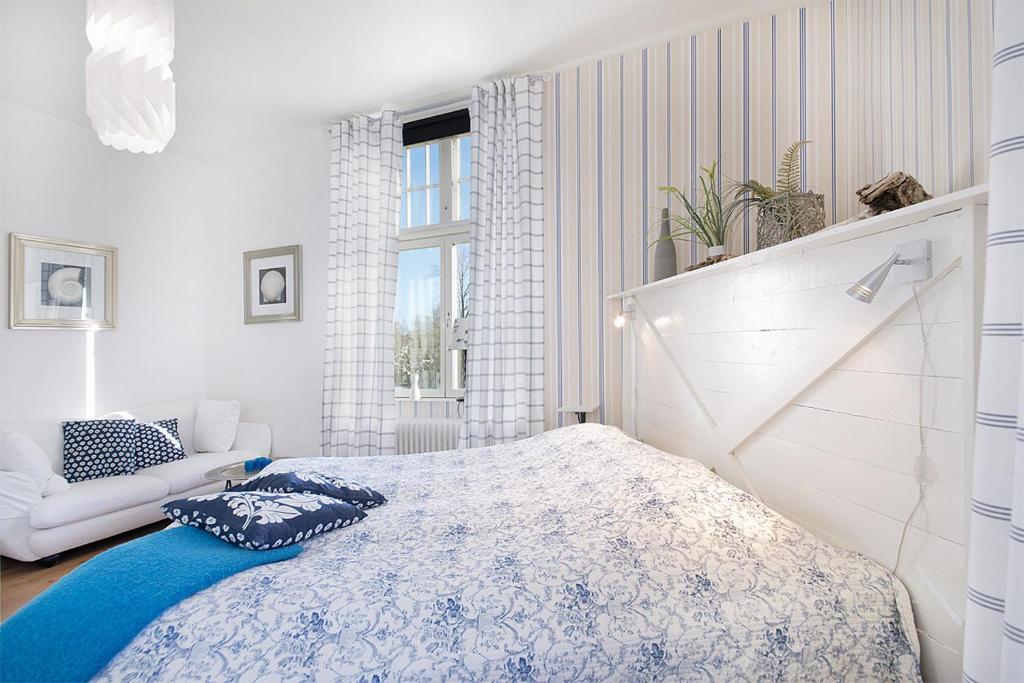 Postel nebo postele na pokoji v ubytování Hotell Aina