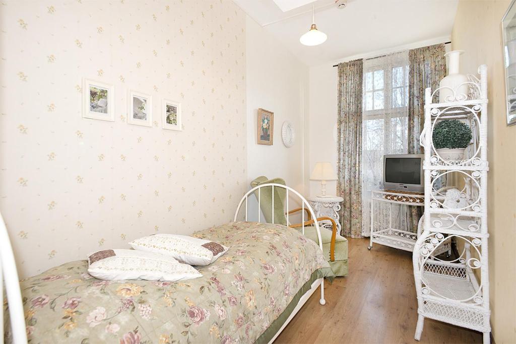Postel nebo postele na pokoji v ubytování Hotell Aina