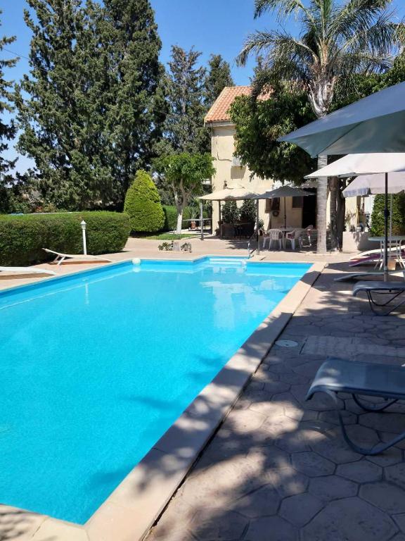 Bazén v ubytování Zena Holiday Villa nebo v jeho okolí
