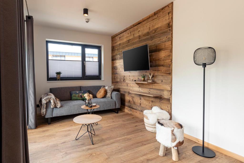 Televízia a/alebo spoločenská miestnosť v ubytovaní Kreischberg Suites by ALPS RESORTS