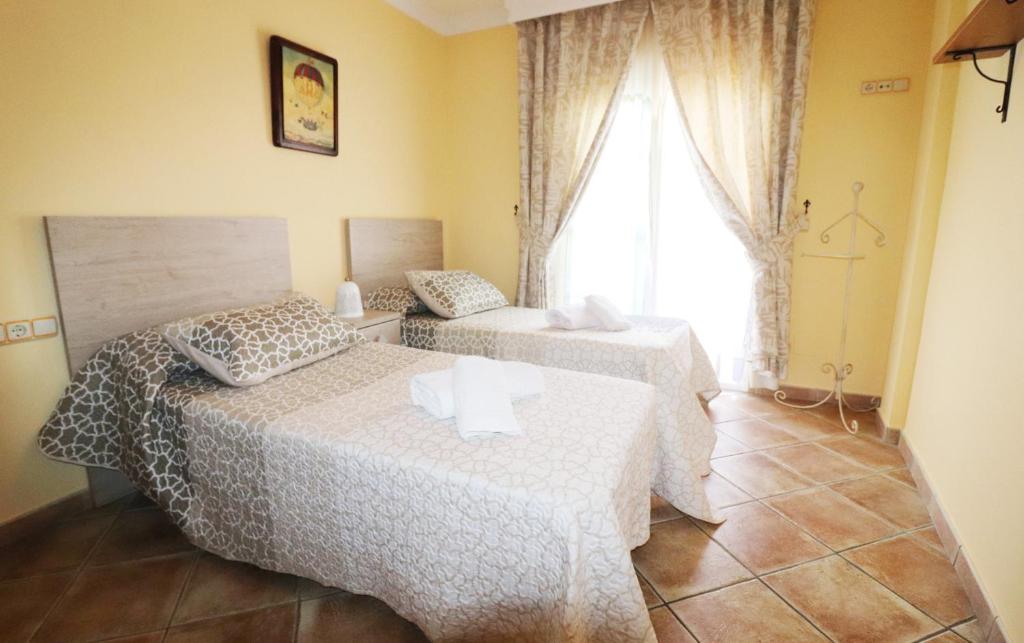 A bed or beds in a room at Casa Sandra Spainsunrentals 1165