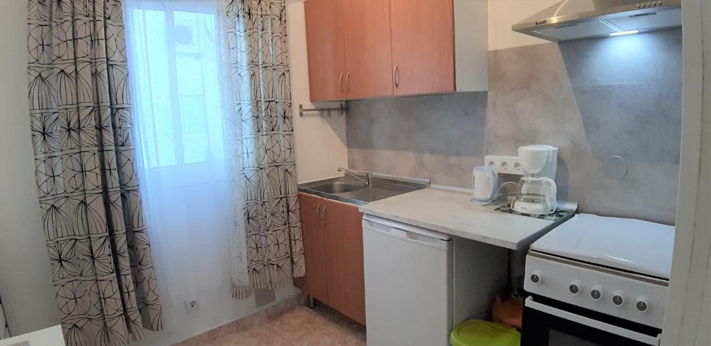 Kuchyň nebo kuchyňský kout v ubytování Hostal Nevada