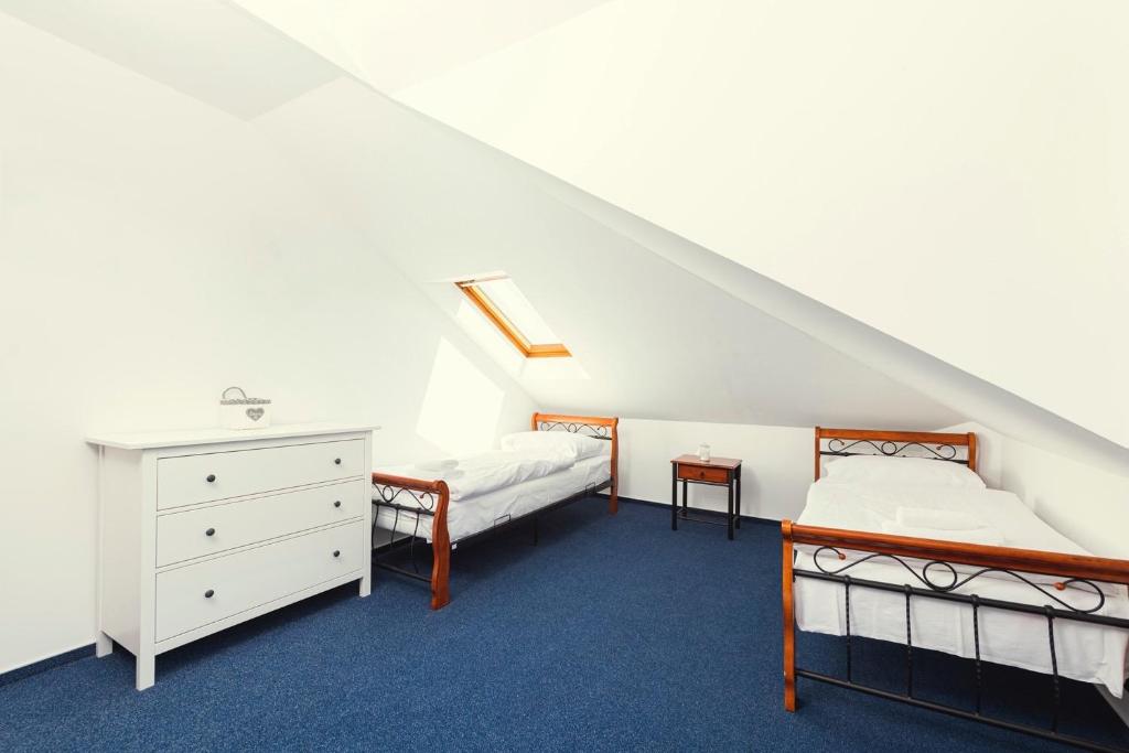 Postel nebo postele na pokoji v ubytování Hotel Ostende