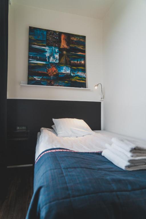 Postel nebo postele na pokoji v ubytování Best Western Hotel Arctic Eden