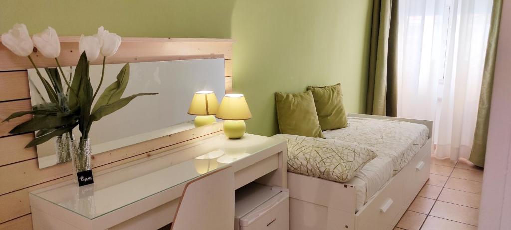 Postel nebo postele na pokoji v ubytování Apulia Bed&Breakfast