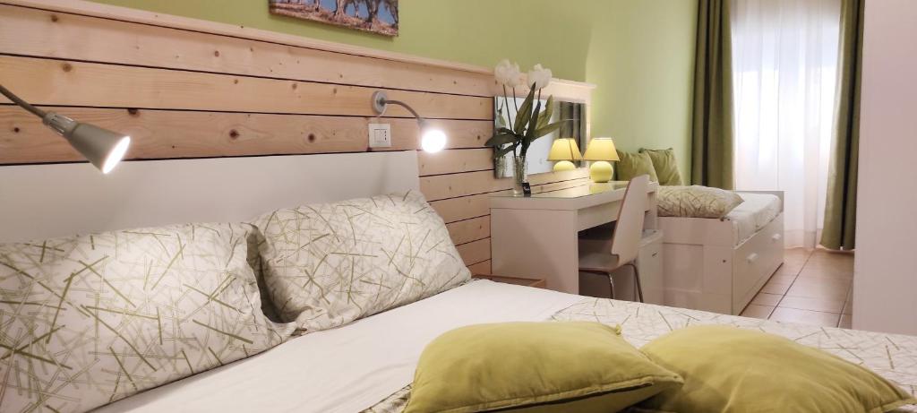 Postel nebo postele na pokoji v ubytování Apulia Bed&Breakfast