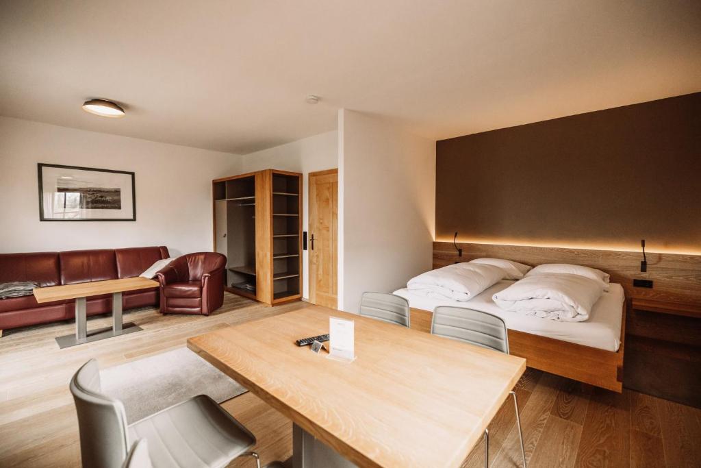Postel nebo postele na pokoji v ubytování Weinhotel Maitz Wolfgang