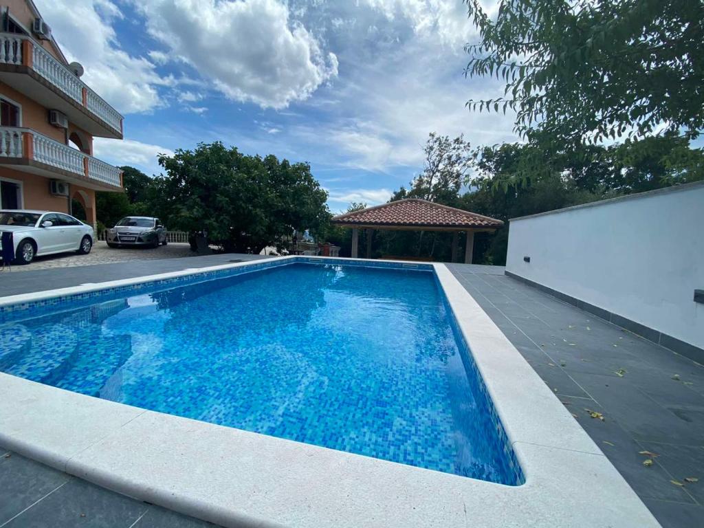 Swimmingpoolen hos eller tæt på Apartments Alen