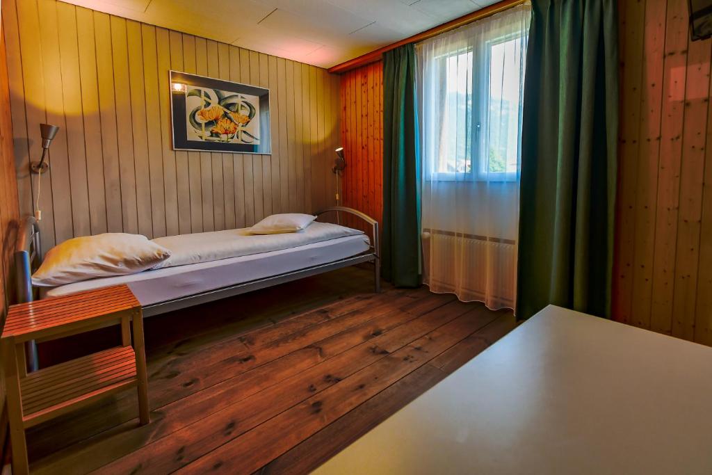 Letto o letti in una camera di Hotel Tell and Apartments