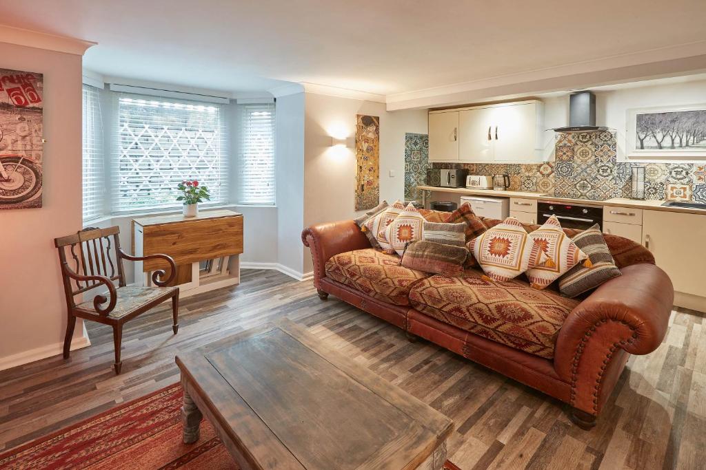 a living room with a couch and a table at Host & Stay - In The Key Of Sea in Saltburn-by-the-Sea