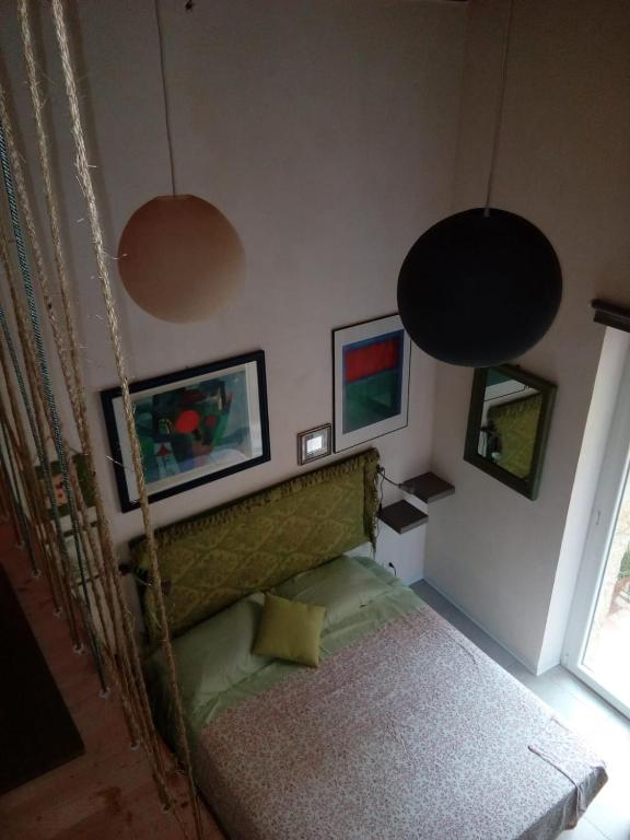 Posteľ alebo postele v izbe v ubytovaní Arimatea Casa Vacanza