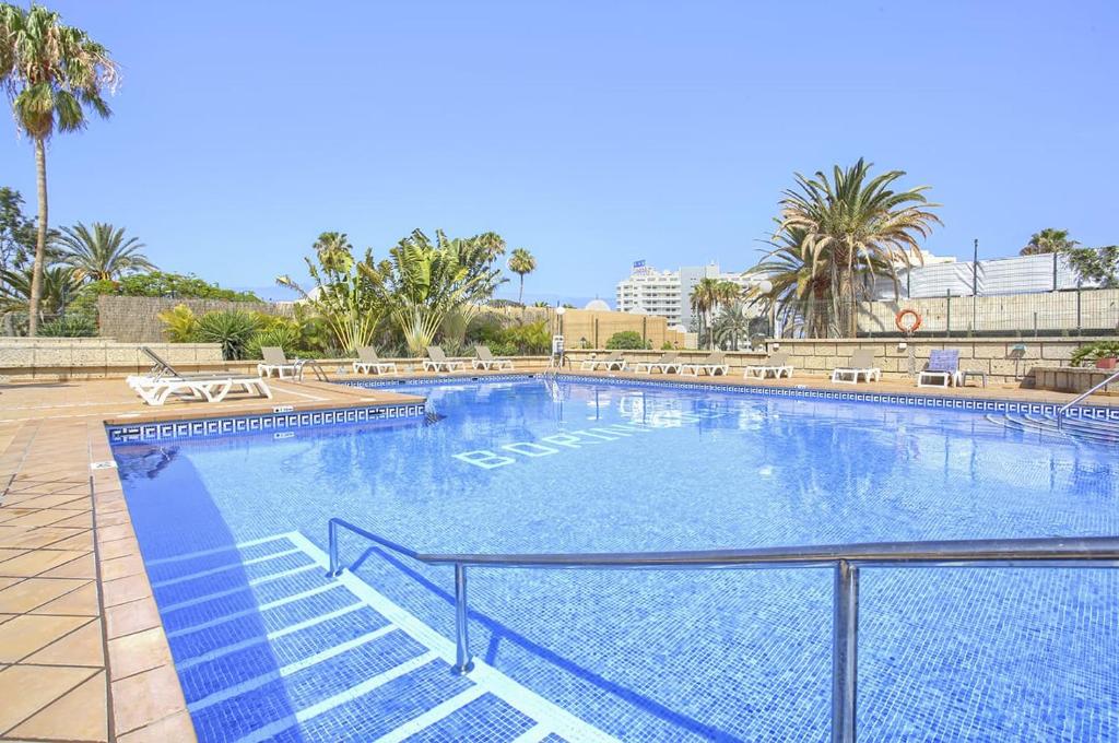 The swimming pool at or close to Studio with sea view in Borinquen