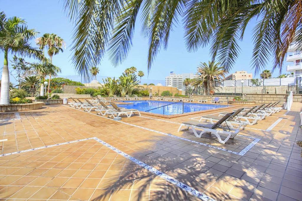 The swimming pool at or close to Studio with sea view in Borinquen