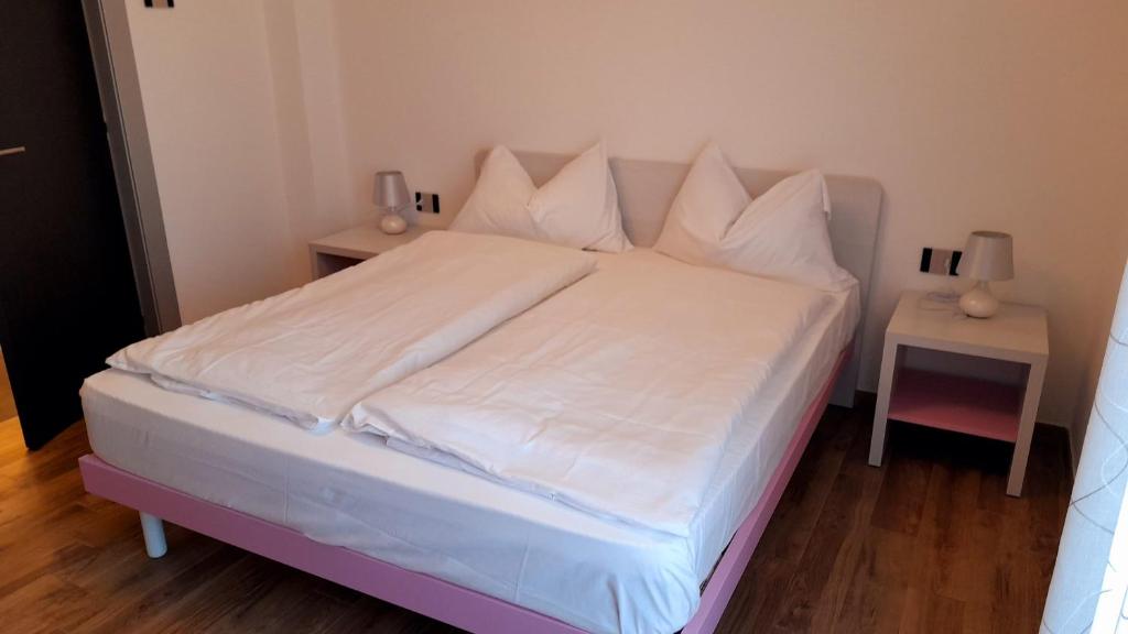 Postel nebo postele na pokoji v ubytování casa vacanze arcobaleno