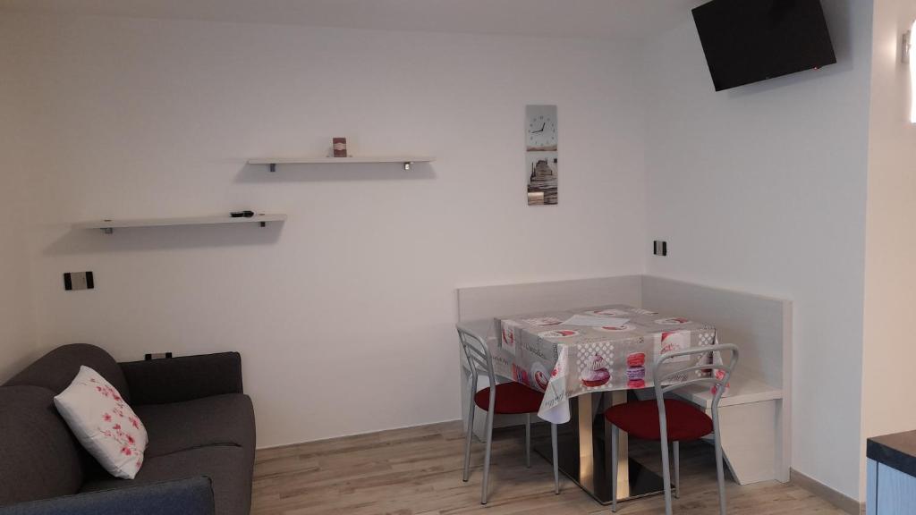 Posezení v ubytování casa vacanze arcobaleno
