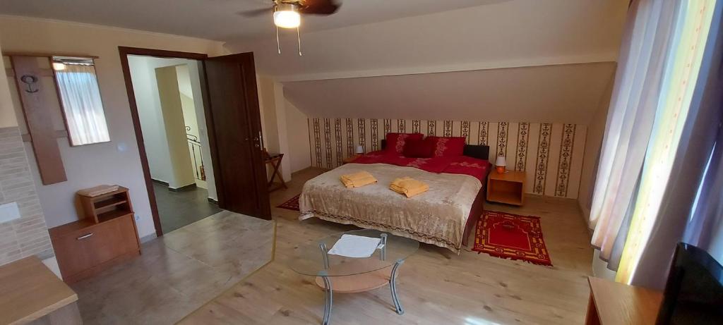 Postel nebo postele na pokoji v ubytování Villa VértesKacsa