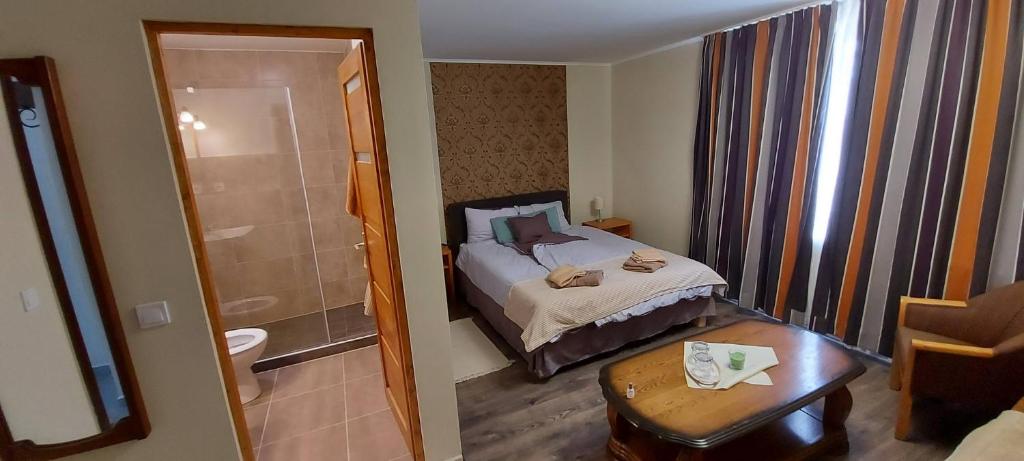 Postel nebo postele na pokoji v ubytování Villa VértesKacsa