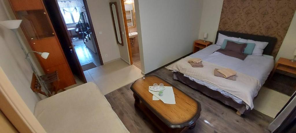 Postel nebo postele na pokoji v ubytování Villa VértesKacsa