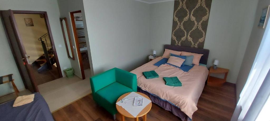Postel nebo postele na pokoji v ubytování Villa VértesKacsa
