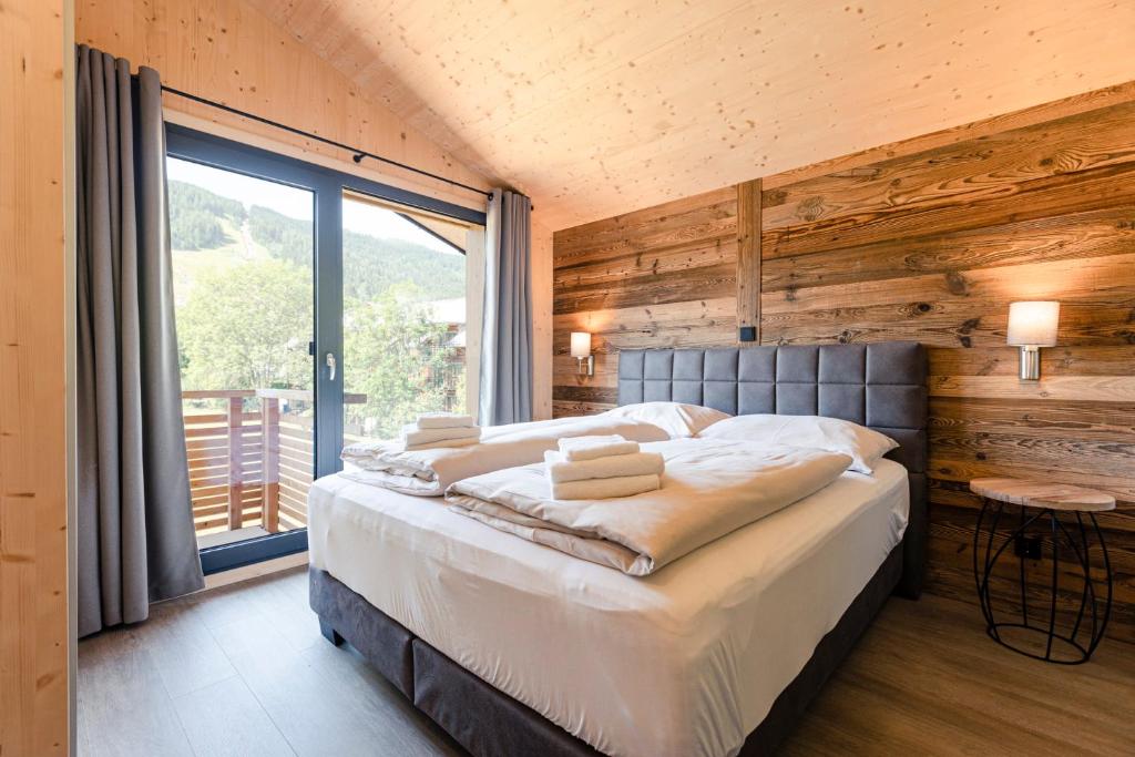 Posteľ alebo postele v izbe v ubytovaní Kreischberg Suites by ALPS RESORTS