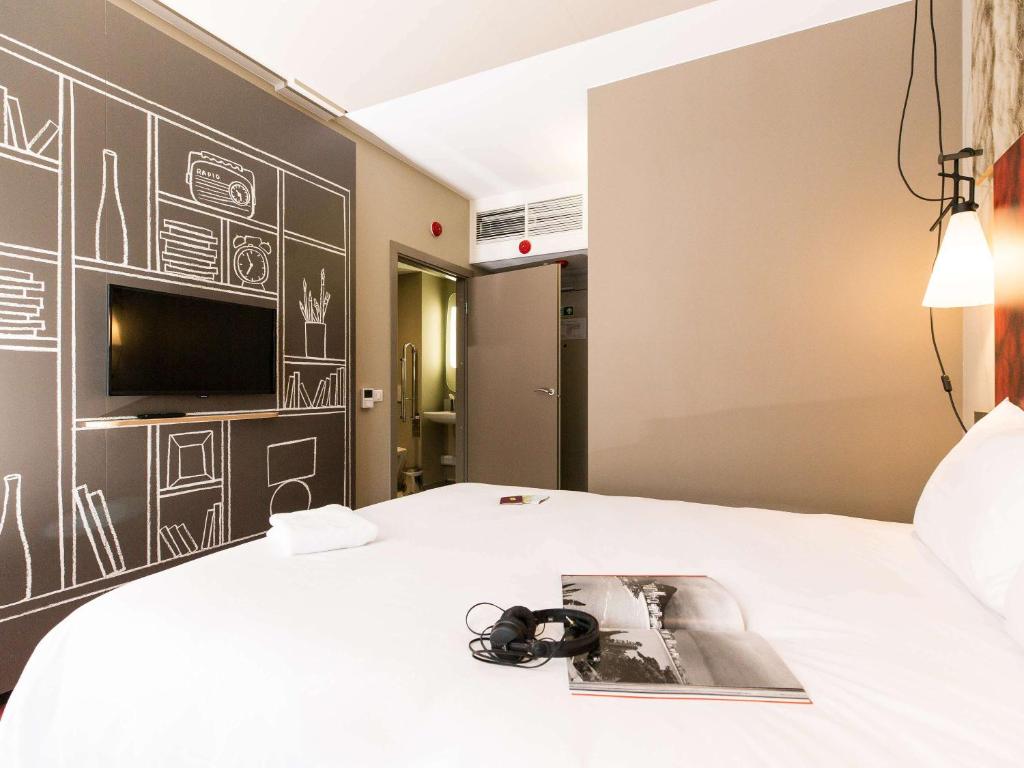 Postel nebo postele na pokoji v ubytování ibis Vilnius Centre
