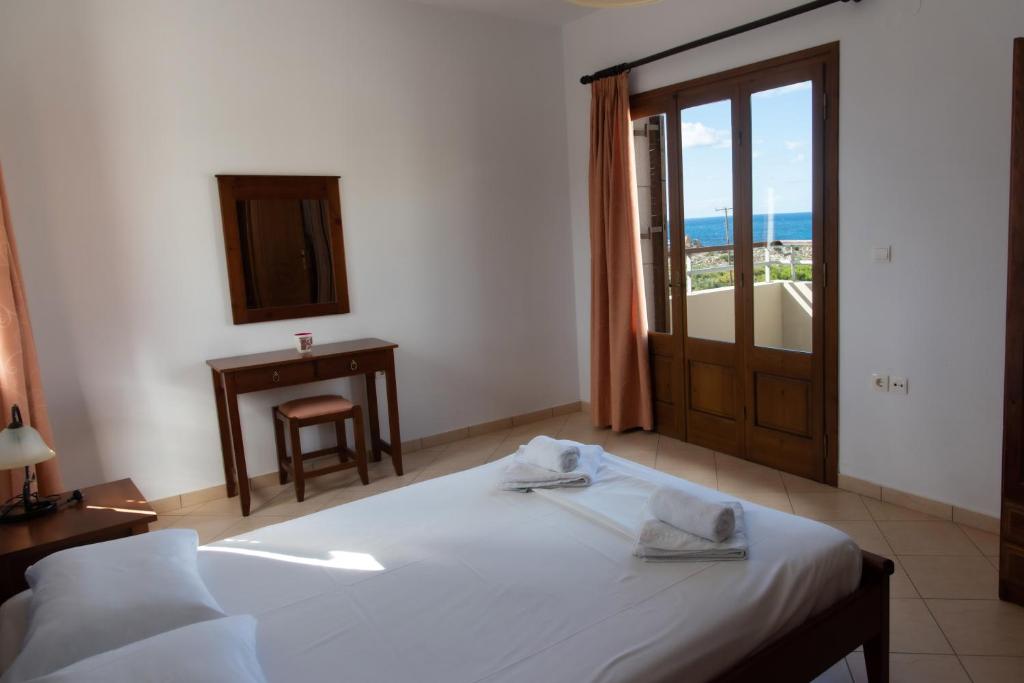 Postel nebo postele na pokoji v ubytování Nireides villas 'TOP DESTINATION'
