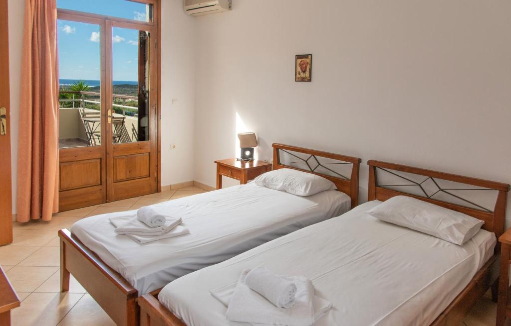 Postel nebo postele na pokoji v ubytování Nireides villas 'TOP DESTINATION'